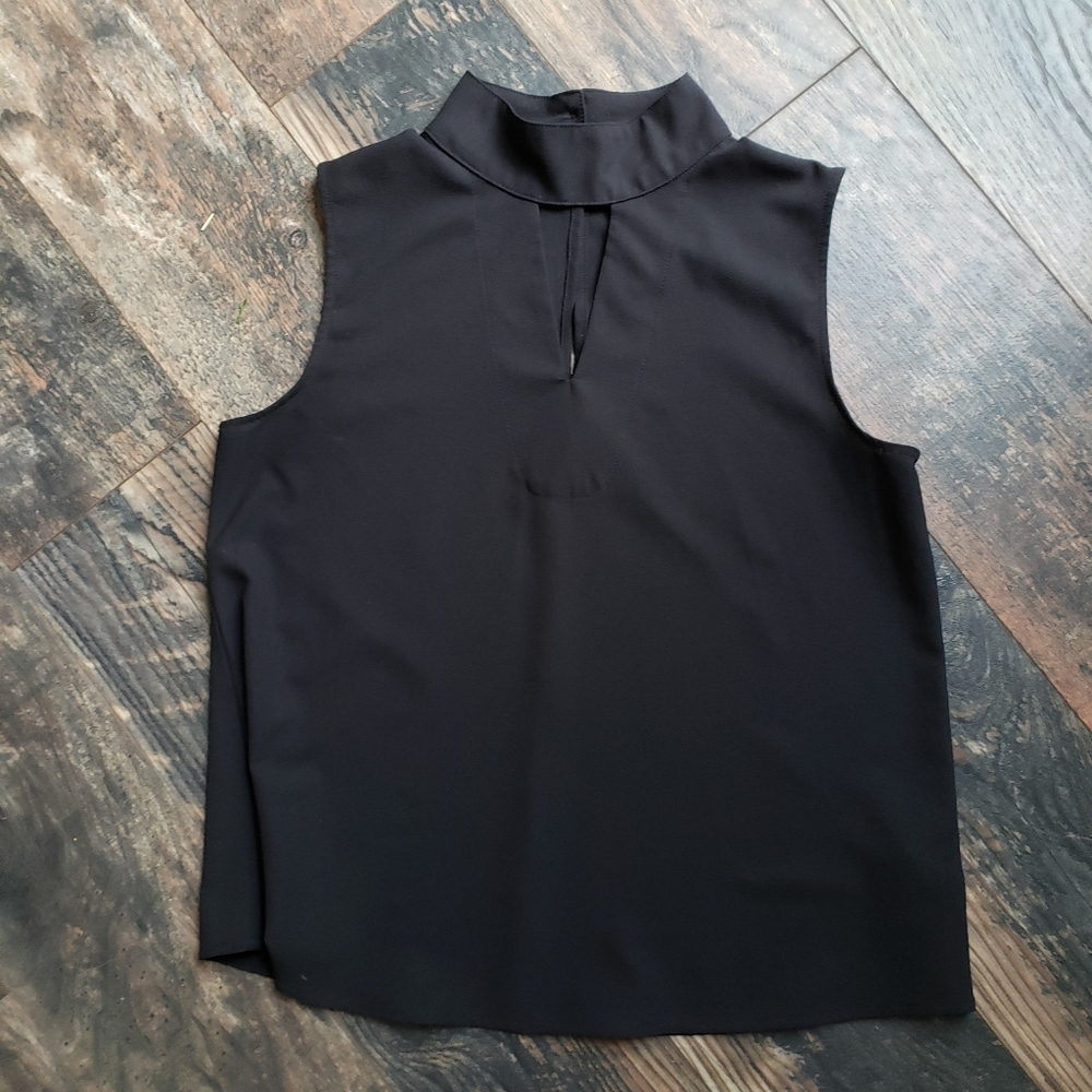 Moc turtle neck sleeveless blouse